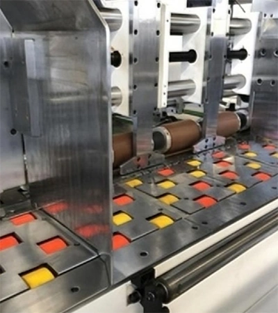 Alimentador de borde delantero