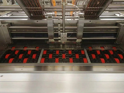 Alimentador de borde delantero